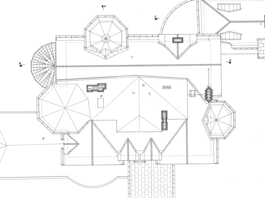 Roof plan from an architectural drawing set, showing octagonal turrets, a hipped roof and a porte-cochère